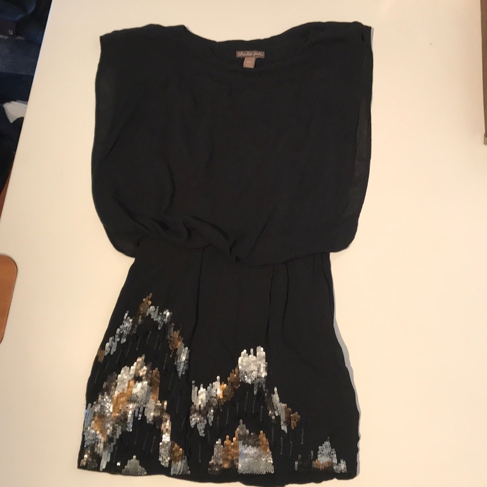 Black holiday dress with sequins.